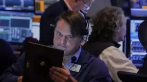 Wall Street Anjlok Setelah Fed Tunjukkan Sikap Lebih Hawkish